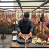 湖南江永:腊味飘香迎岁末 传统工艺富乡邻