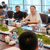 毛万春在湖南财信金融控股集团调研