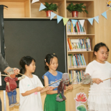 湘潭大学“数承湘影”三下乡实践团开展非遗纸影公益课堂