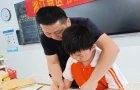 墨香润校园！书法家进校为小学生启蒙书法