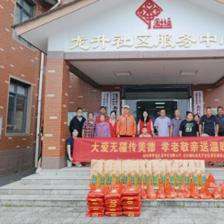 石峰区龙头铺街道龙升社区联合爱心企业开展困难群众慰问活动