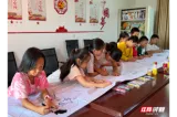 十米长卷绘古建 湘潭县农家书屋阅读推广走进排头岭村