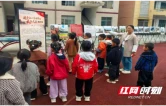 吉首大学纪念红二方面军长征胜利九十周年摄影展走进保靖县阳朝小学
